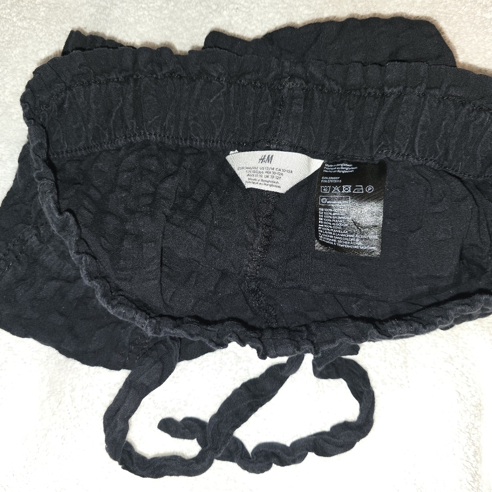 Girls black h&m shorts size 12/14
